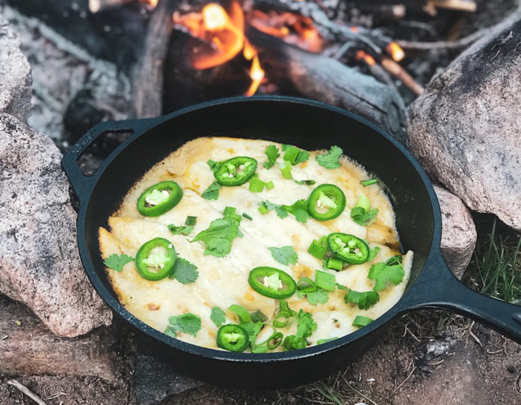 Campfire enchiladas in a dutch oven! The perfect camping recipe.